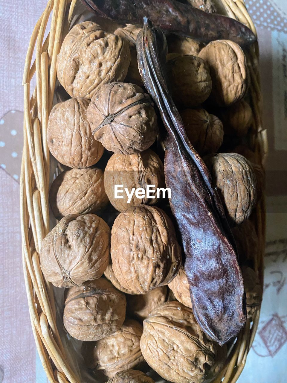 food, food and drink, basket, healthy eating, freshness, wellbeing, produce, container, still life, nuts & seeds, no people, indoors, walnut, plant, large group of objects, high angle view, abundance, close-up, nut, wicker, nut - food, dried food, vegetable, directly above, ingredient, fruit