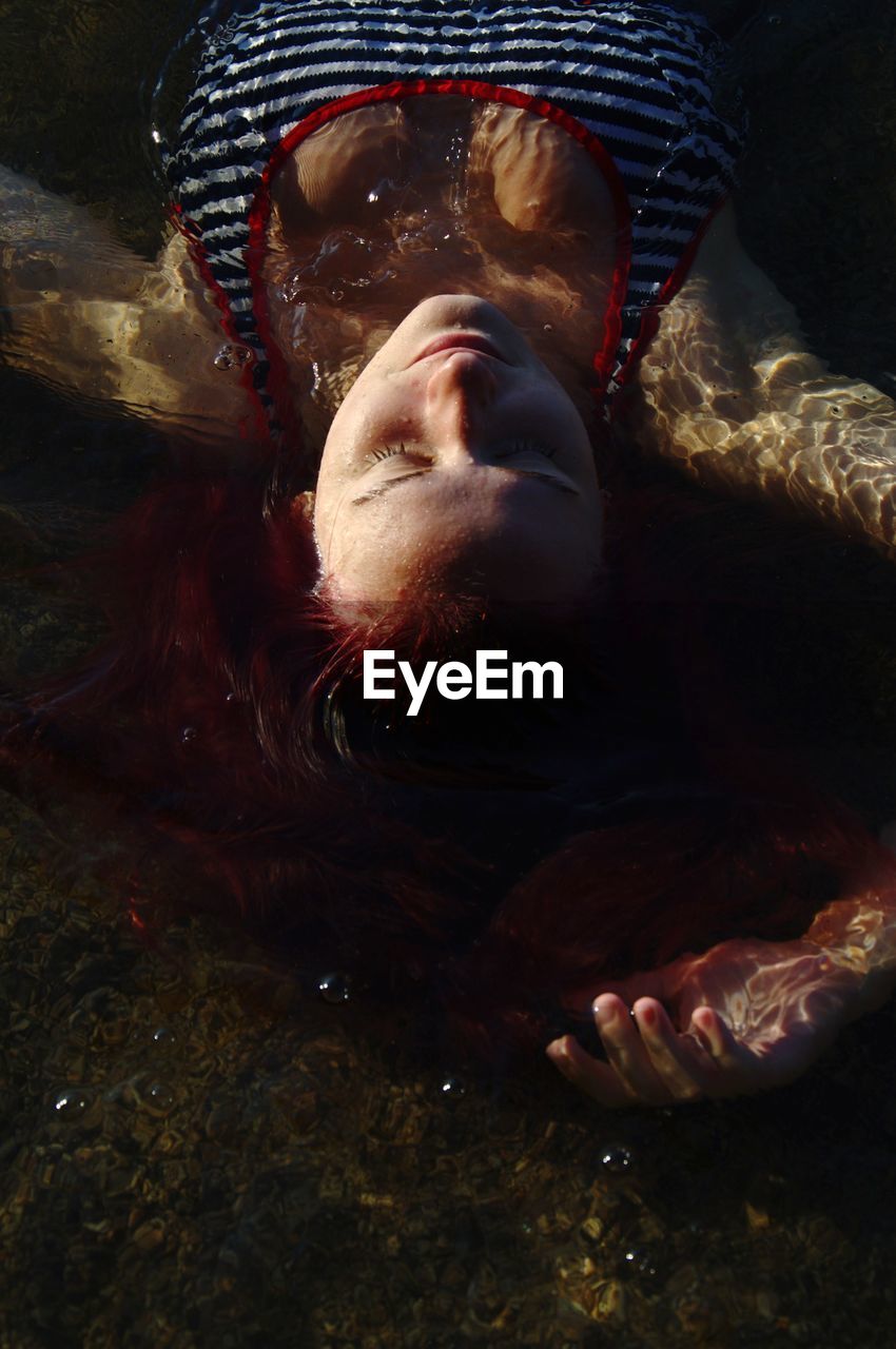 High angle portrait of woman resting