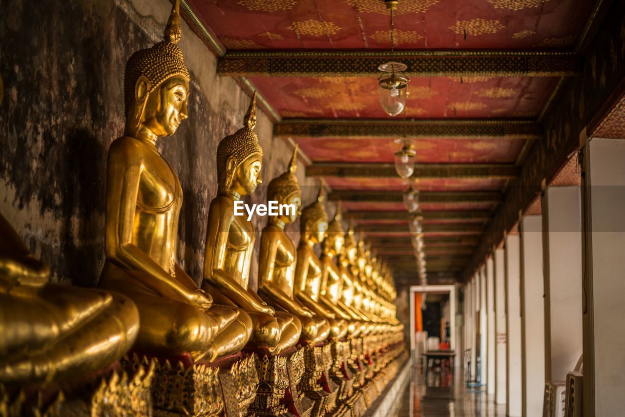 Golden buddha statues in wat suthat temple