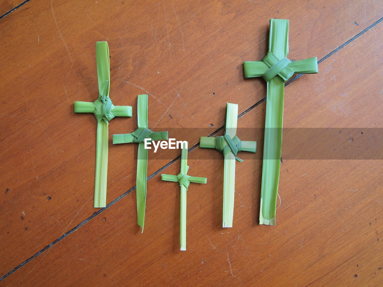 wood, symbol, cross, green, indoors, no people, table, soldier, high angle view, crucifix