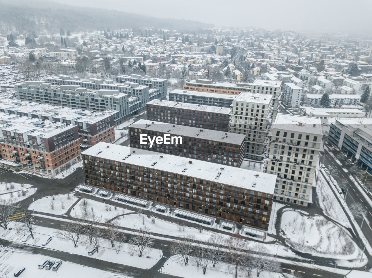HIGH ANGLE VIEW OF CITY DURING WINTER