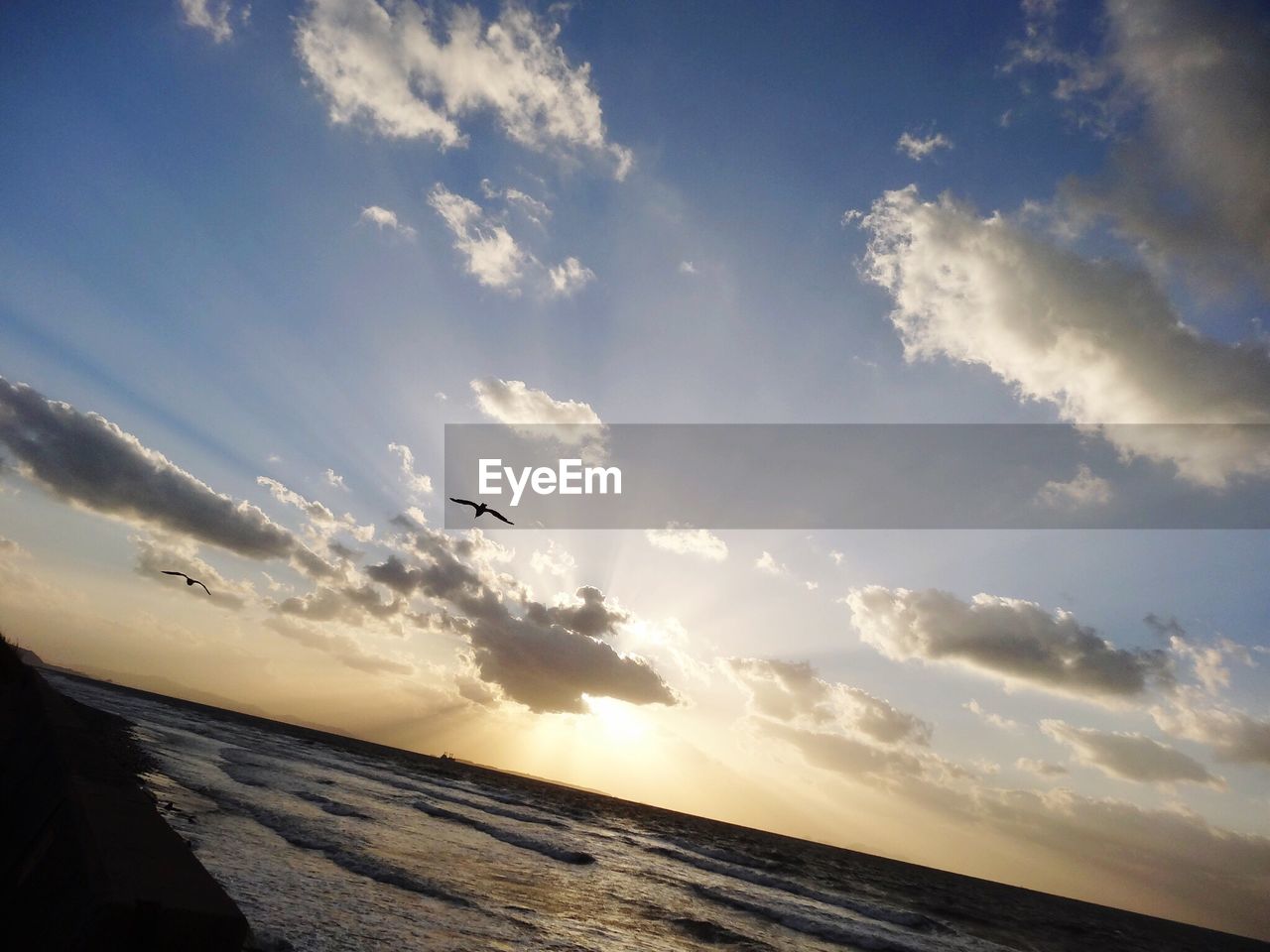 SCENIC VIEW OF SKY OVER CLOUDS