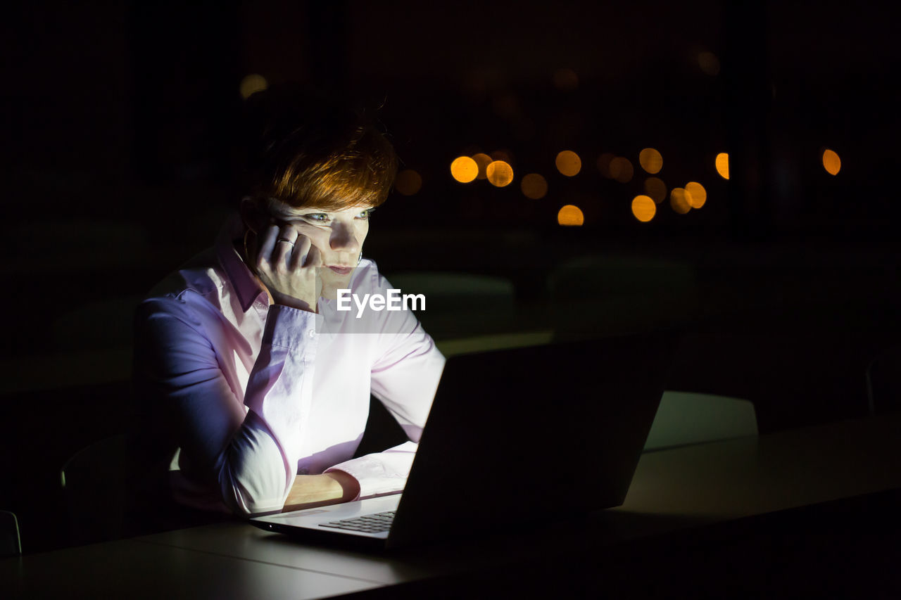 MAN WORKING ON TABLE