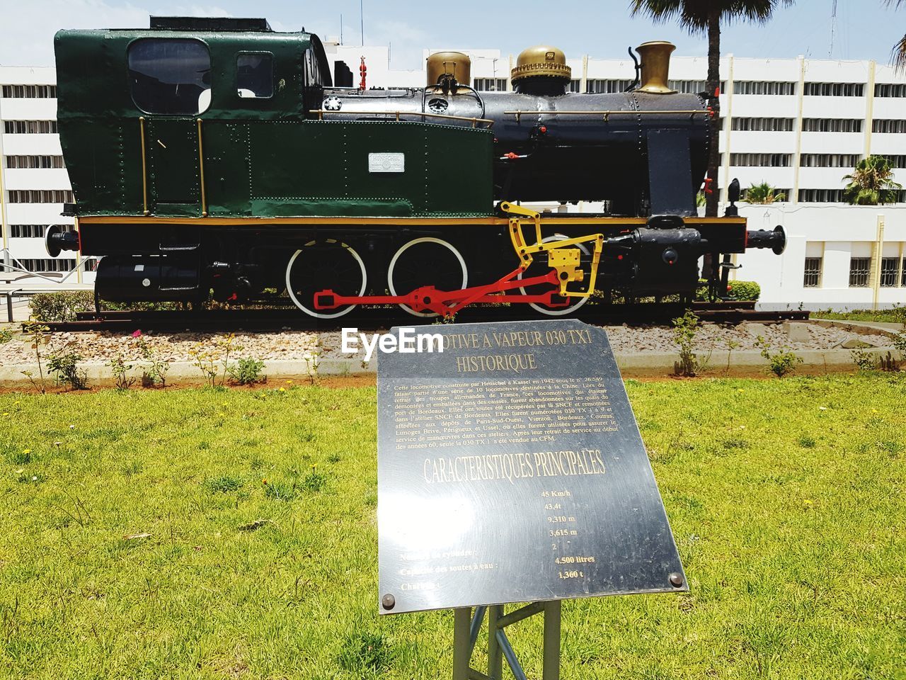 INFORMATION SIGN ON FIELD BY LAND