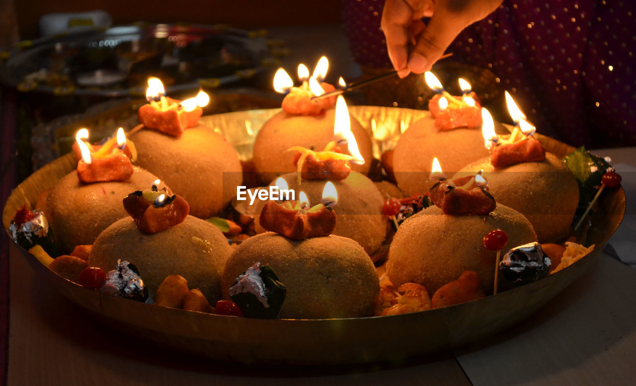 Lit diyas on food