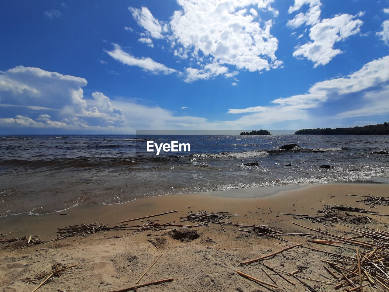 VIEW OF BEACH AGAINST SKY