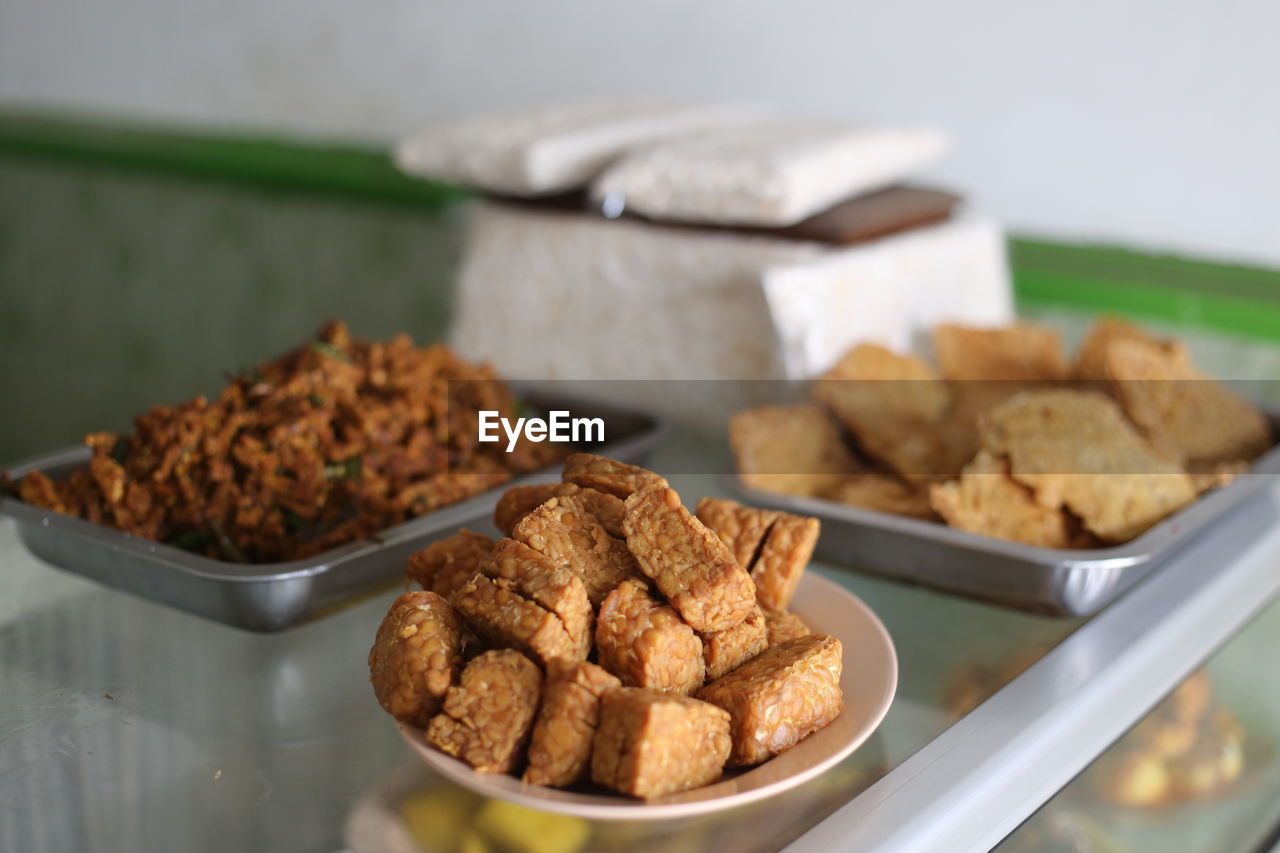 Close-up of food in plates on table