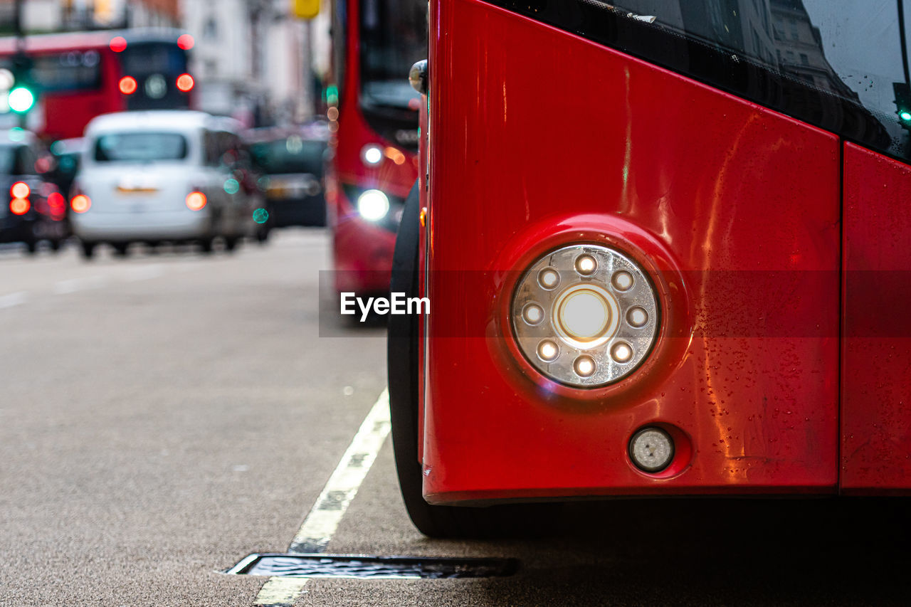 CLOSE-UP OF TELEPHONE BOOTH ON ROAD