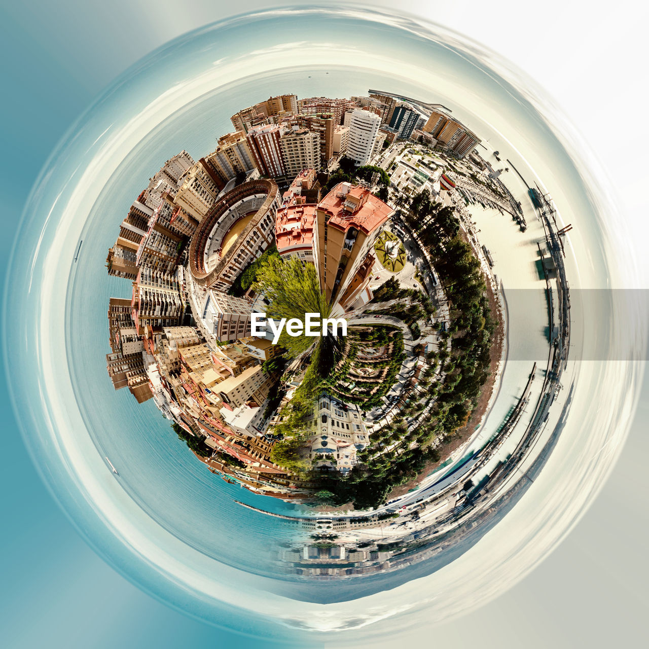 Little planet format of city and sky