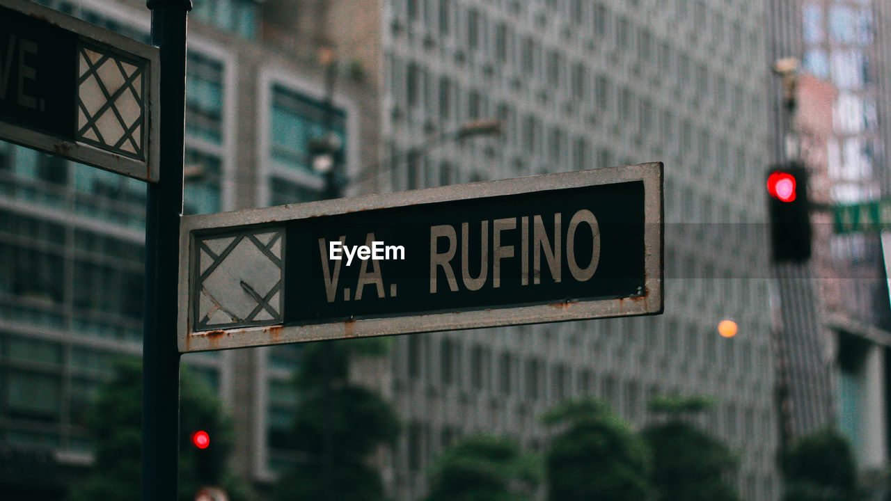 Close-up of information sign in v.a. rufino street makati