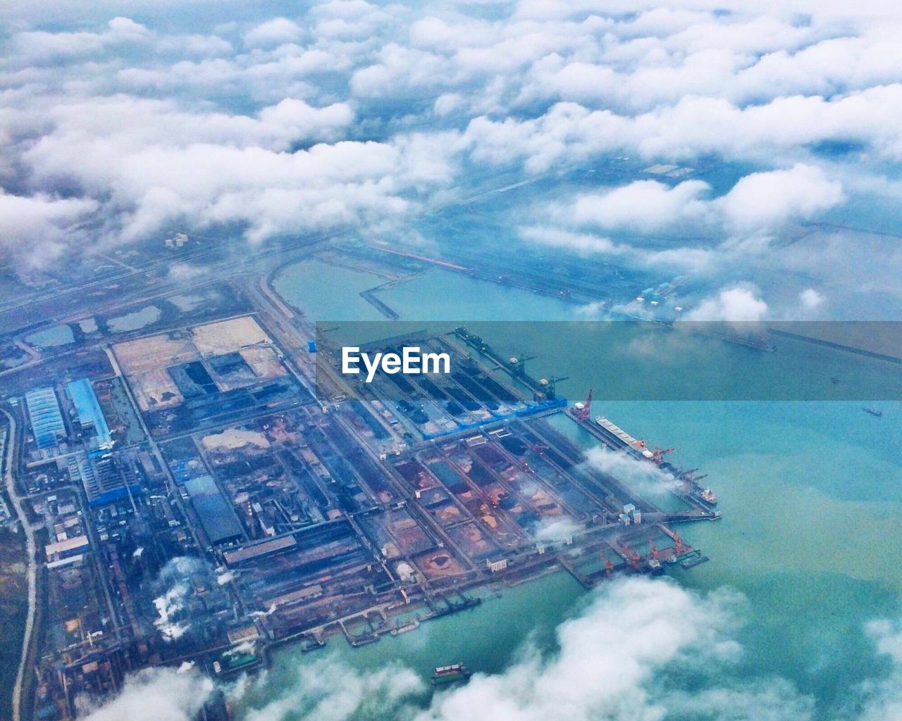 AERIAL VIEW OF CITYSCAPE AND SKY
