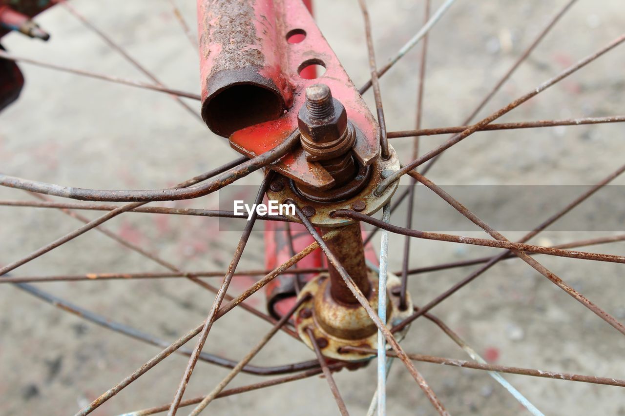 Close-up of rusty bicycle spoke