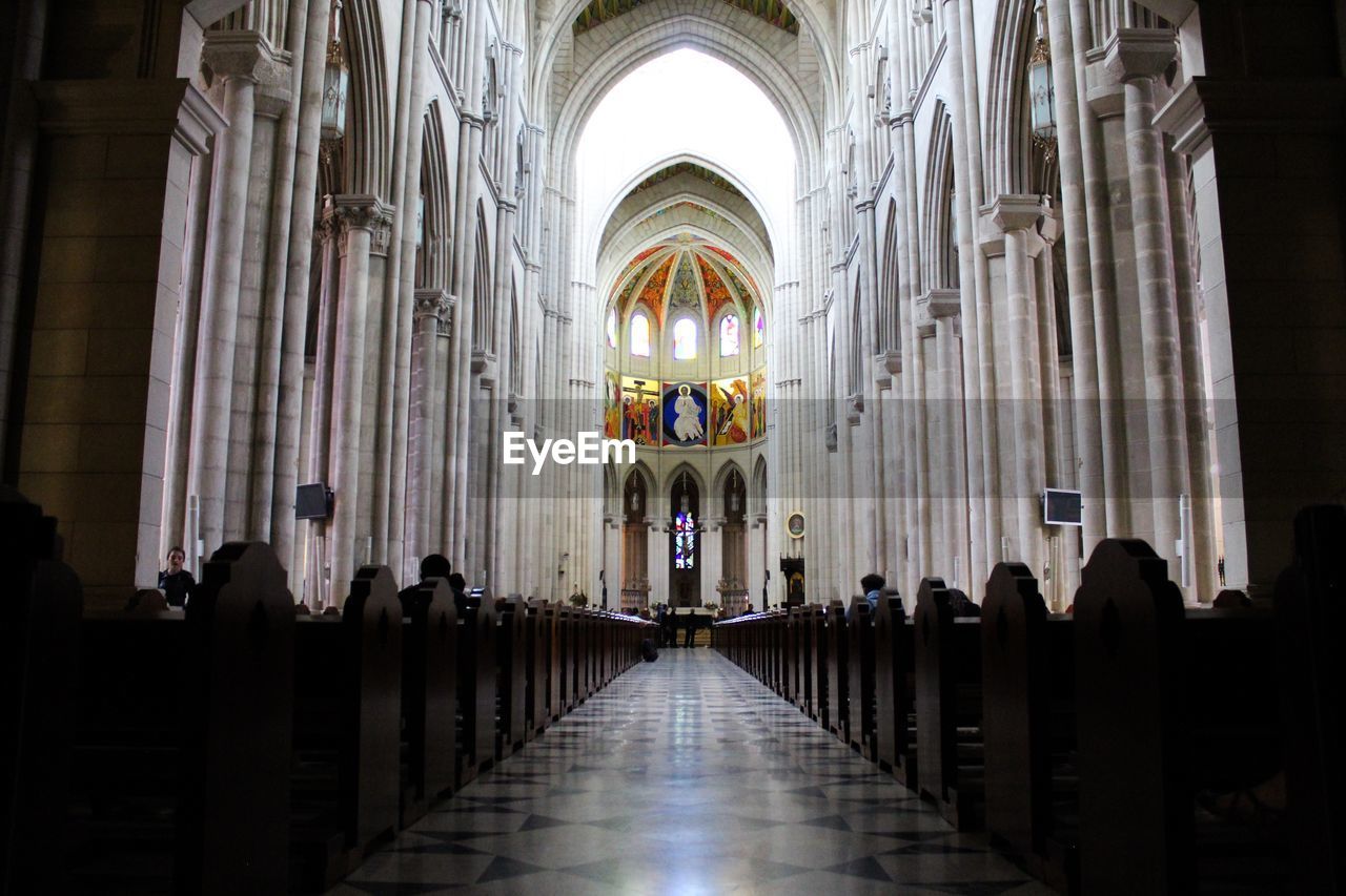 CORRIDOR OF BUILDING WITH CATHEDRAL