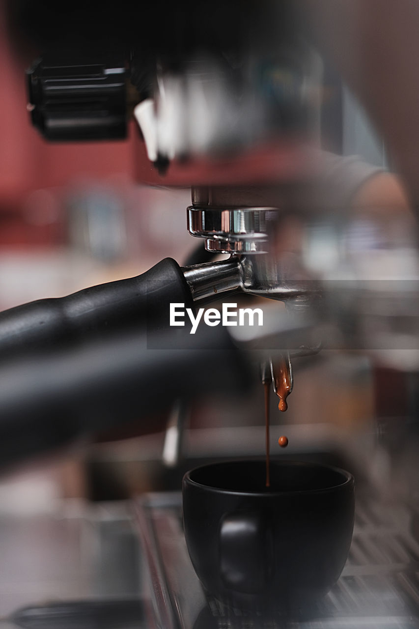 Close-up of coffee cup in cafe