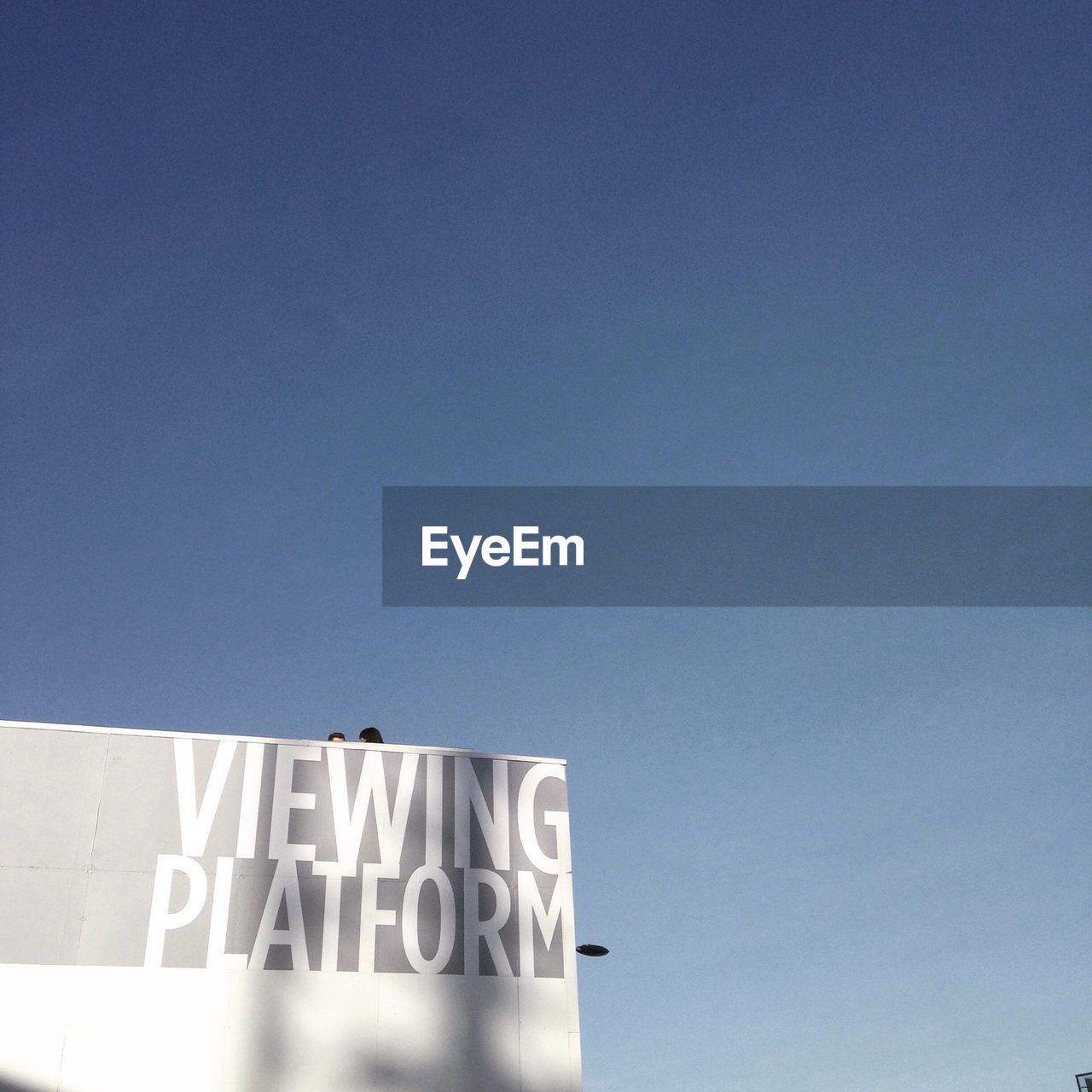 Viewing platform board against blue sky