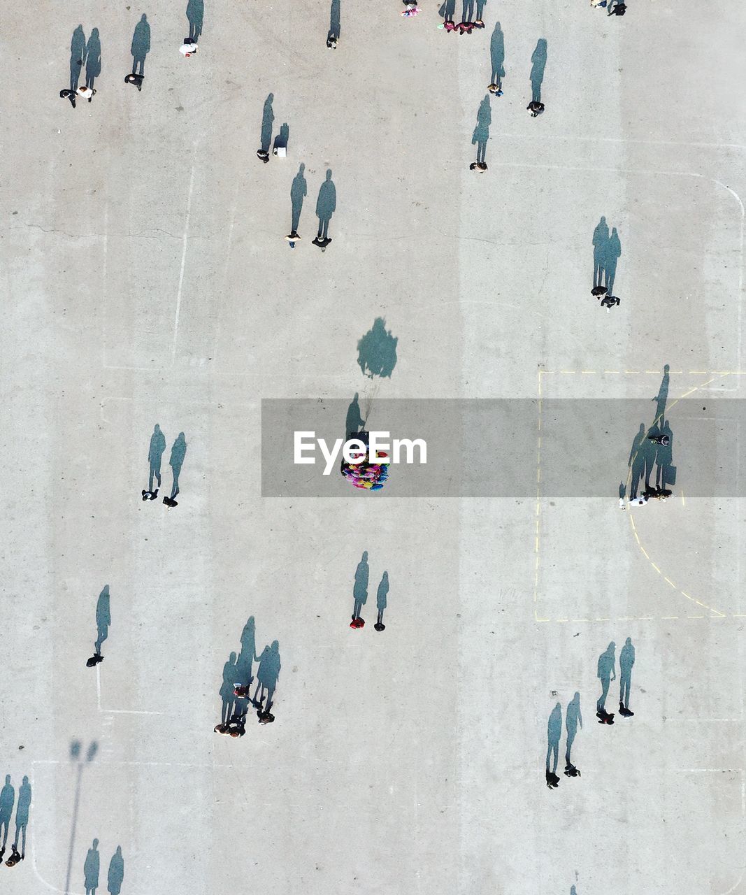 Aerial view of people on street in city