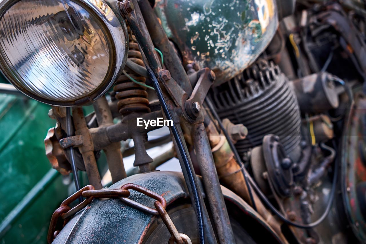 Close-up of old rusty motorcycle