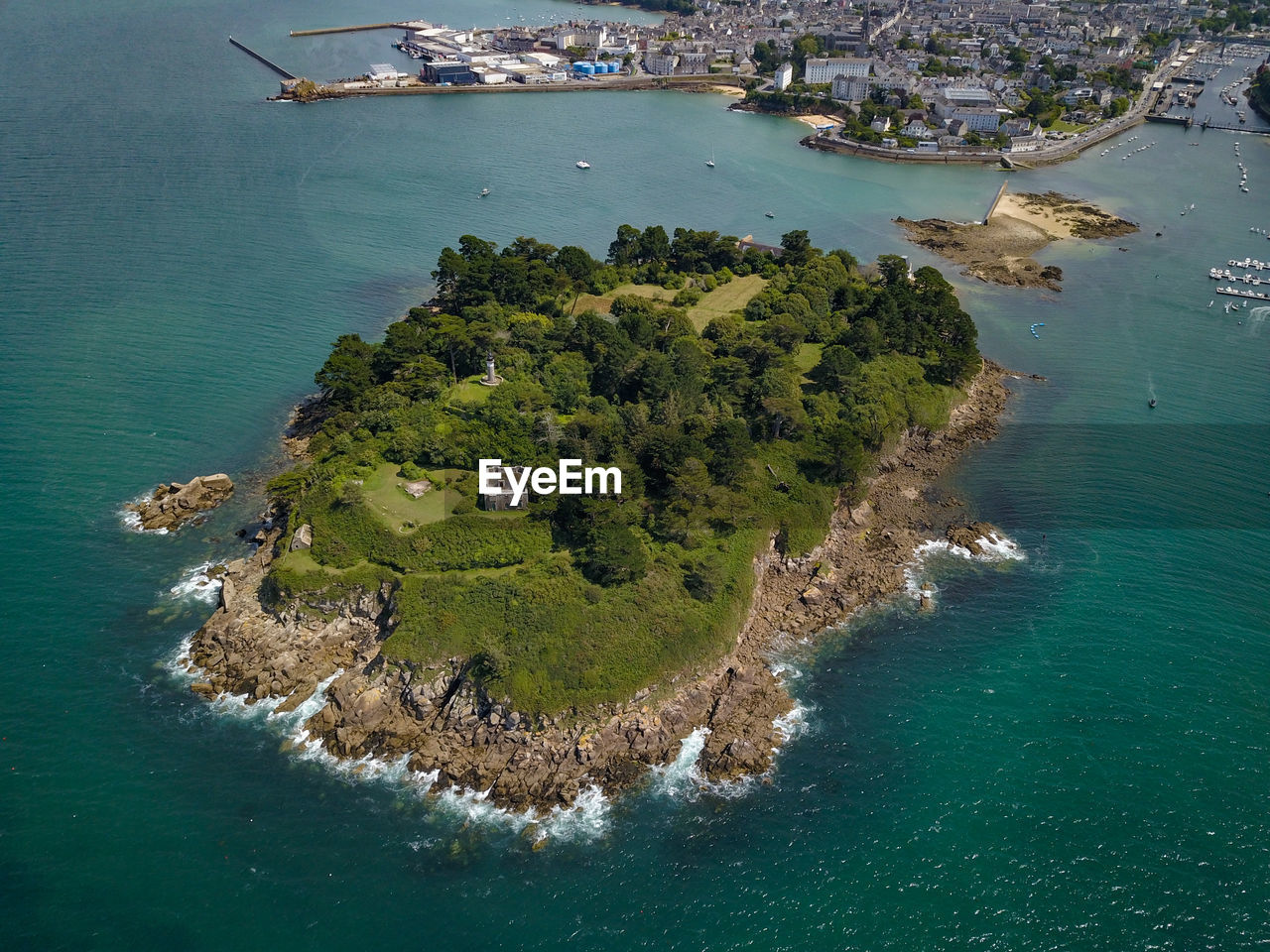 HIGH ANGLE VIEW OF SEA BY BUILDINGS