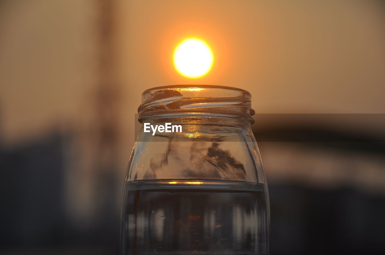 Close-up of glass jar on table