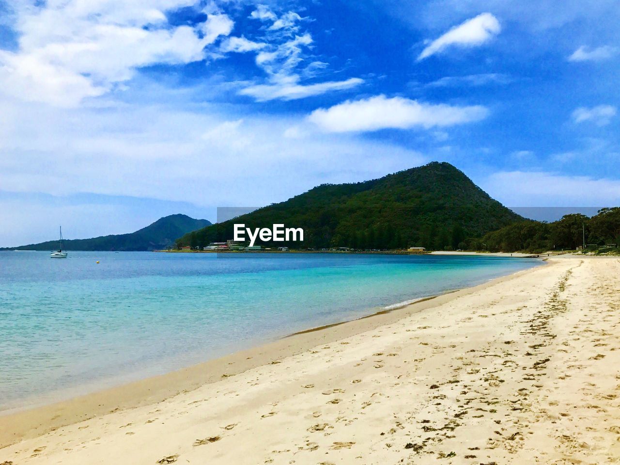 Scenic view of shoal bay against sky