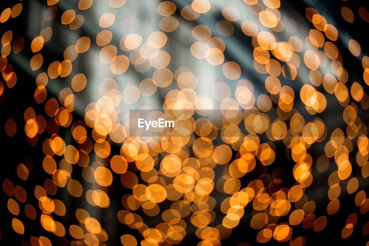 Defocused image of illuminated christmas lights