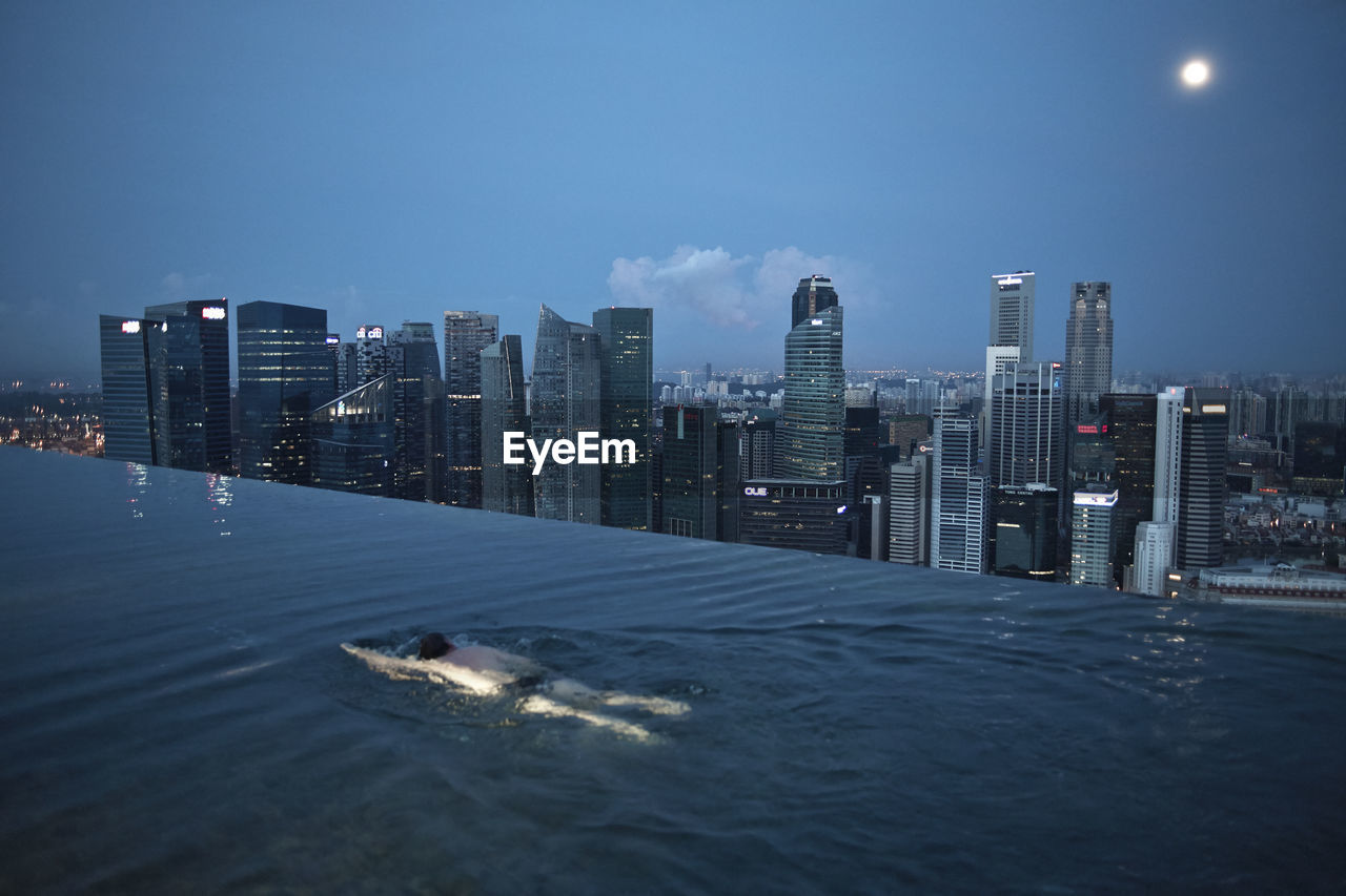 High angle view of man swimming in pool