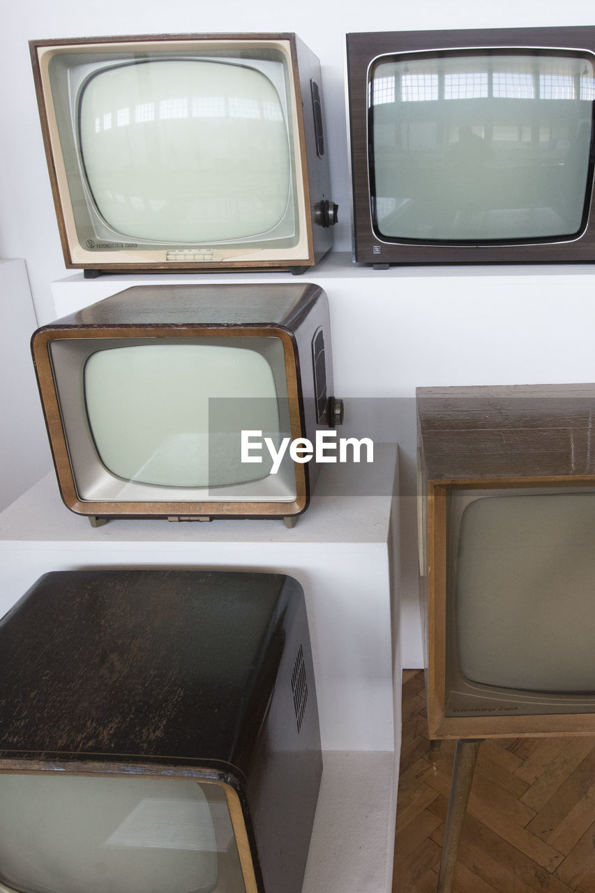 A television or tv set, audiovisual mass medium and news media