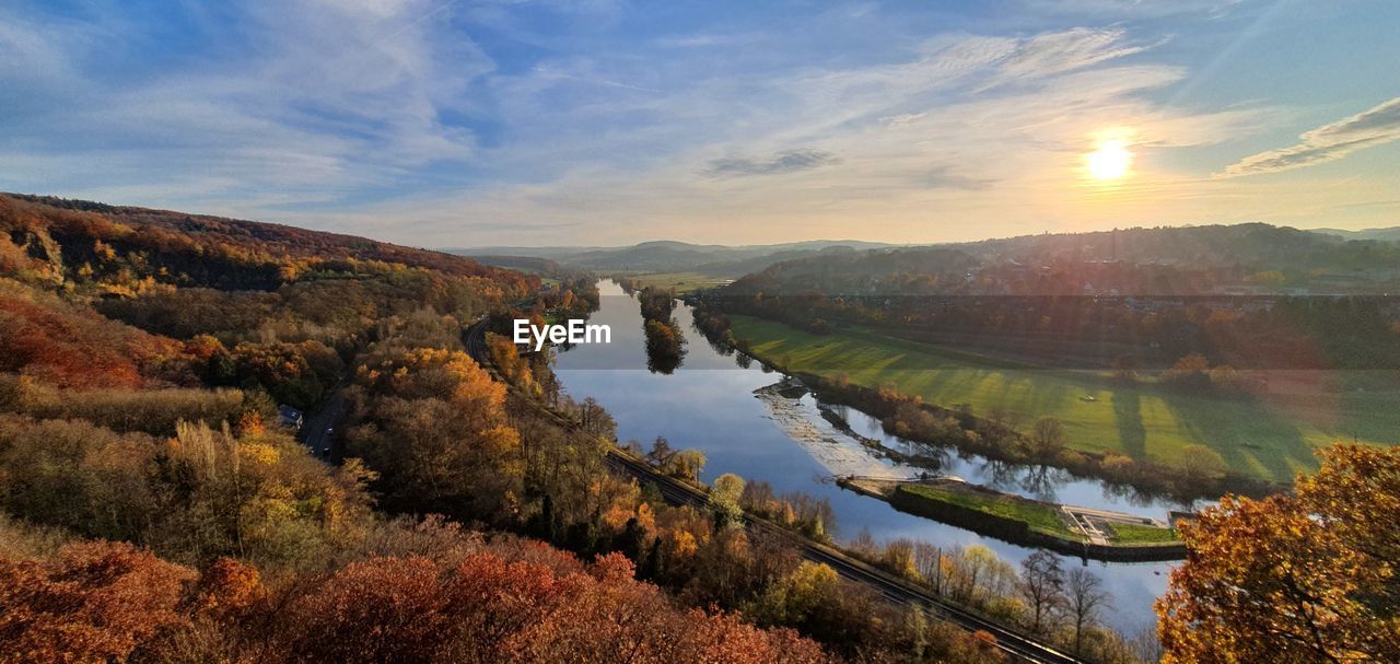 Scenic view of lake against sky during autumn