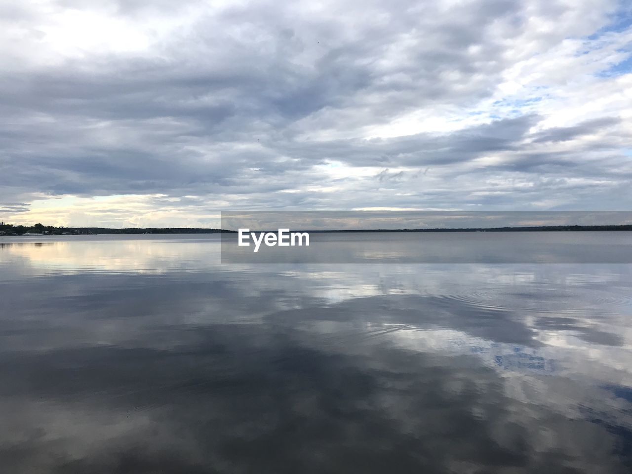 SCENIC VIEW OF CLOUDS OVER SEA