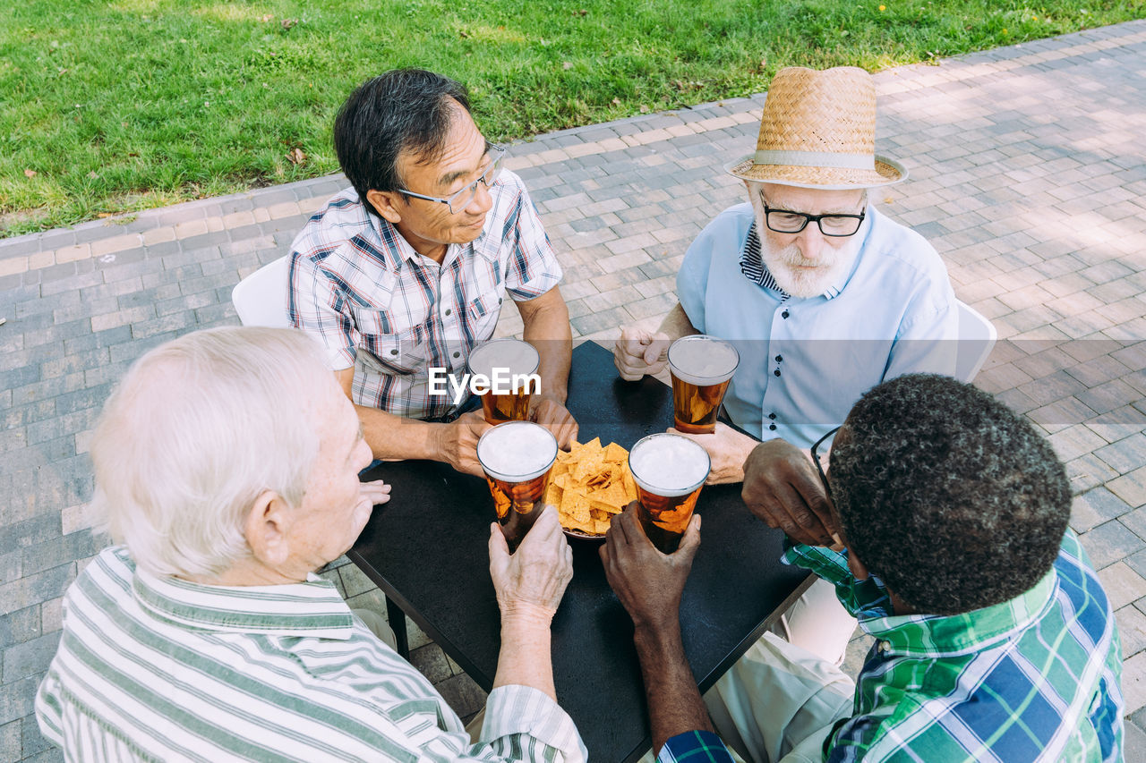 High angle view of people sitting outdoors