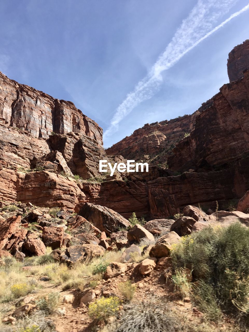 Scenic view of rocky mountains against sky