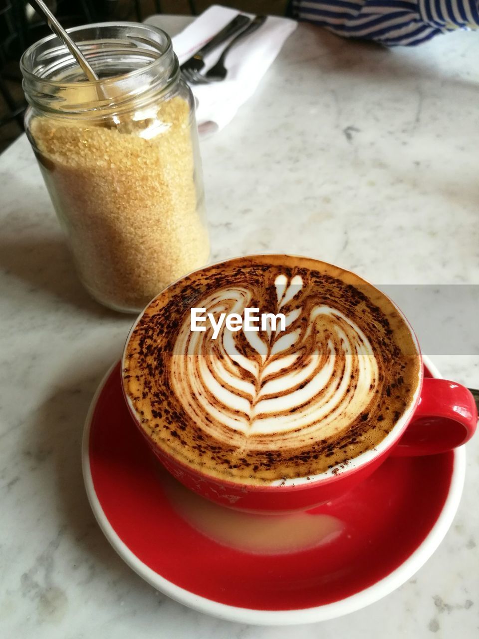 Close-up of coffee cup on table