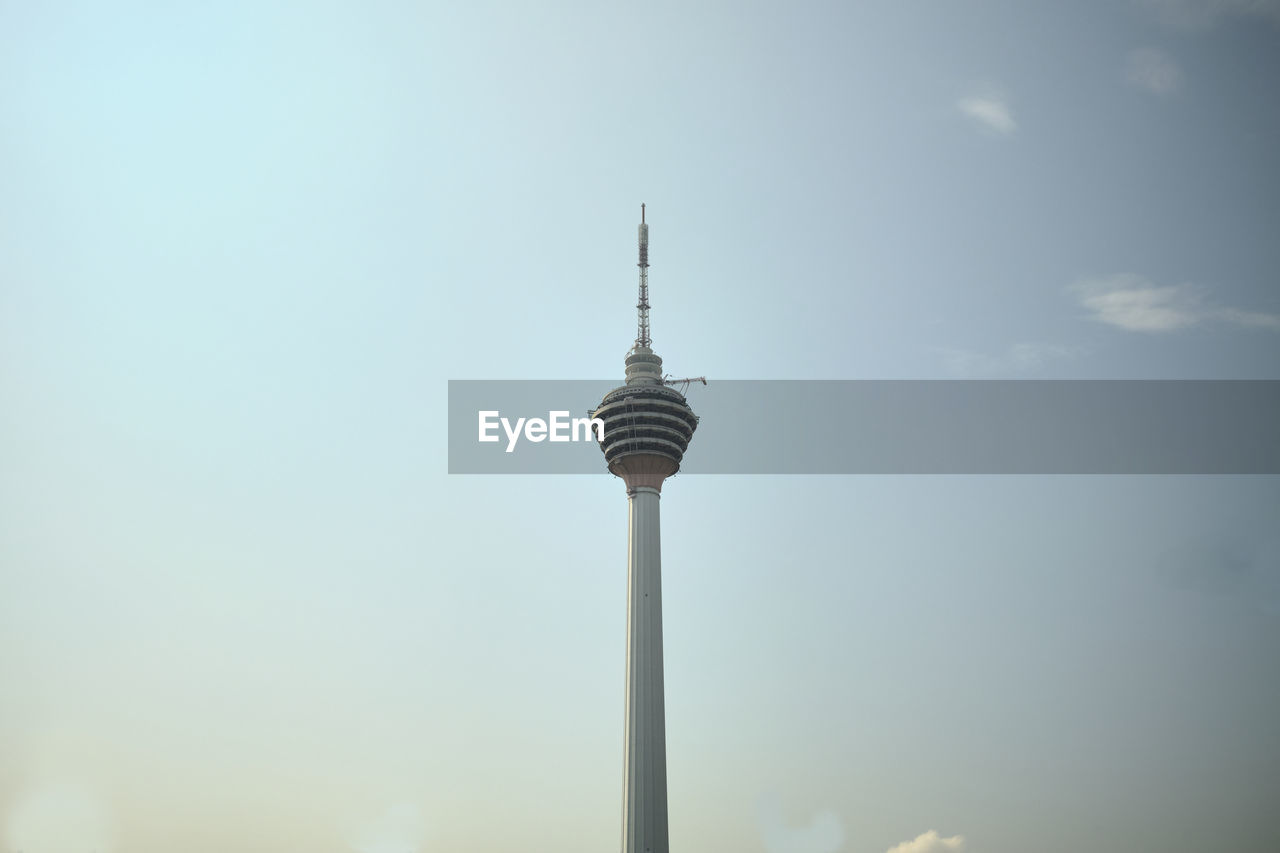 Low angle view of kl tower against sky