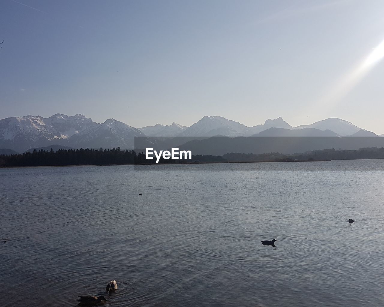 SCENIC VIEW OF LAKE AND MOUNTAINS