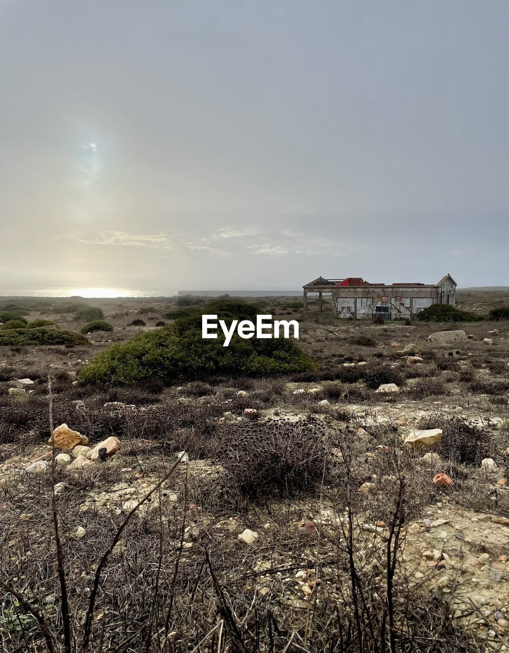sky, coast, sea, nature, shore, land, architecture, water, environment, horizon, landscape, built structure, building, scenics - nature, beach, building exterior, rock, cloud, no people, ocean, plant, beauty in nature, tranquility, travel destinations, outdoors, morning, tranquil scene, travel, house, rural area, natural environment, tourism, non-urban scene, day, tree, terrain, horizon over water, coastline