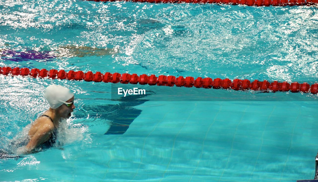 Side view of a swimmer in water