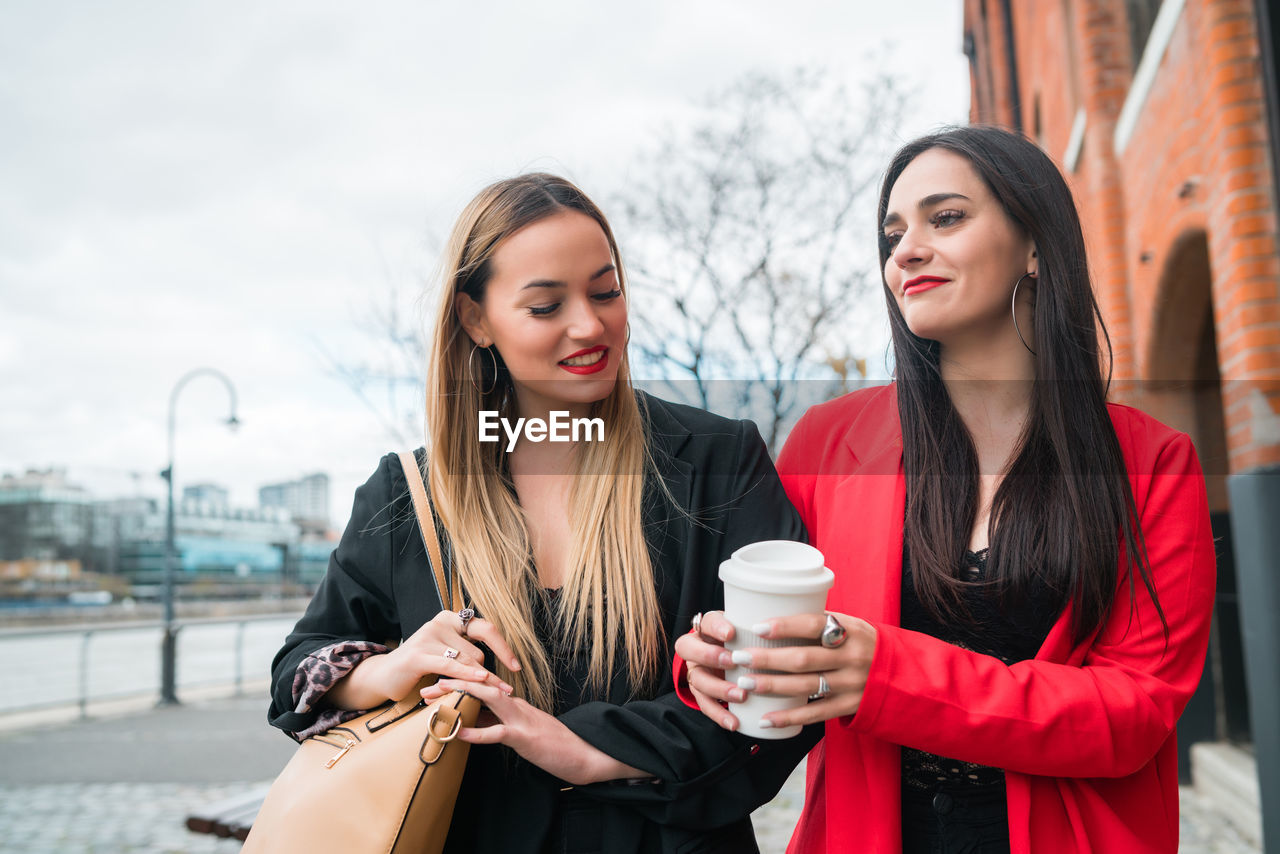 Beautiful young women in city