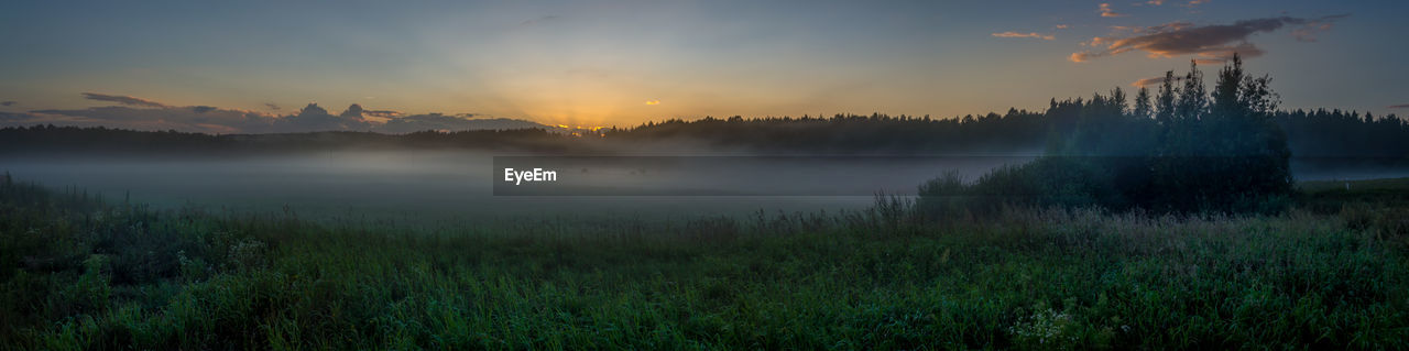 Panoramic shot of land against sky during sunset