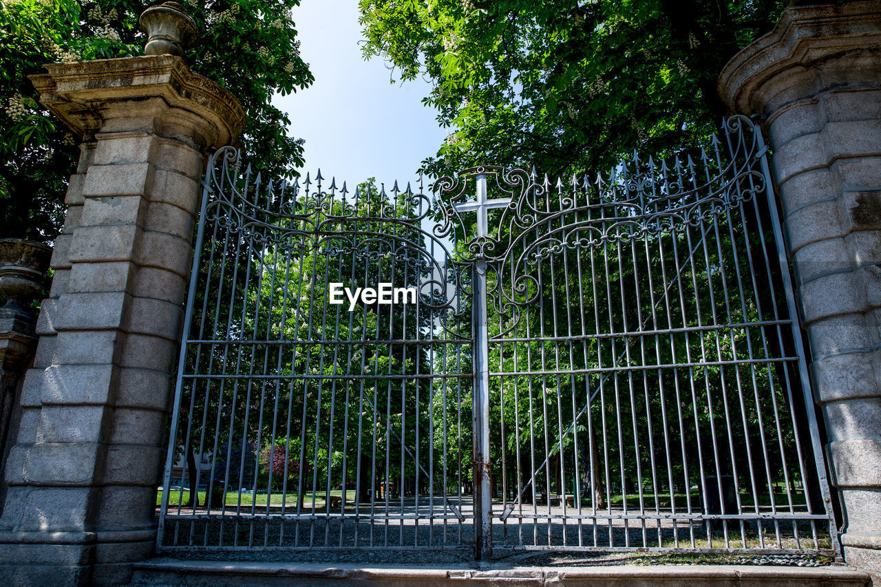 Park closed in milan, italy. covid-19 lockdown. no one in the street. desert city quarantine