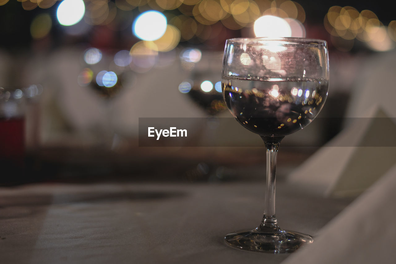 Close-up of wine glass on table in restaurant