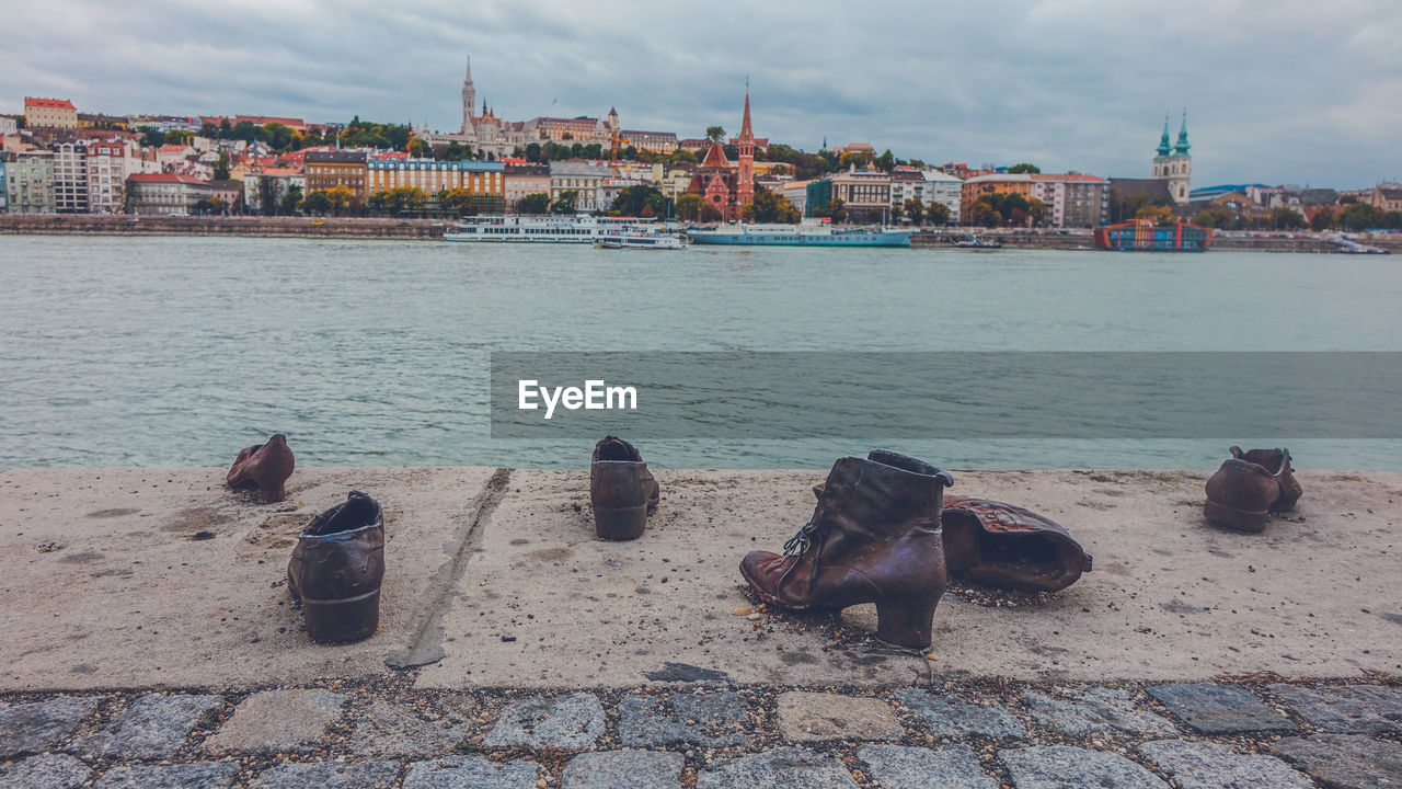 PANORAMIC VIEW OF RIVER AGAINST BUILDINGS