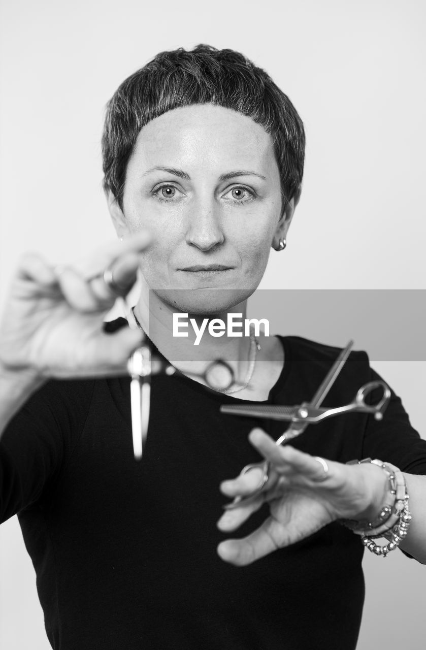 Black and white portrait of a woman hairdresser