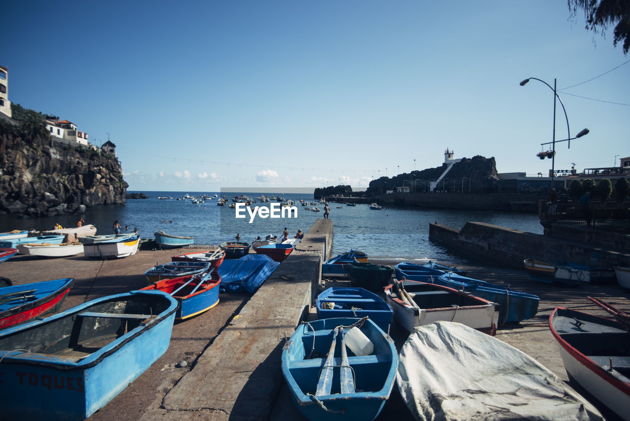 boats moored in harbor