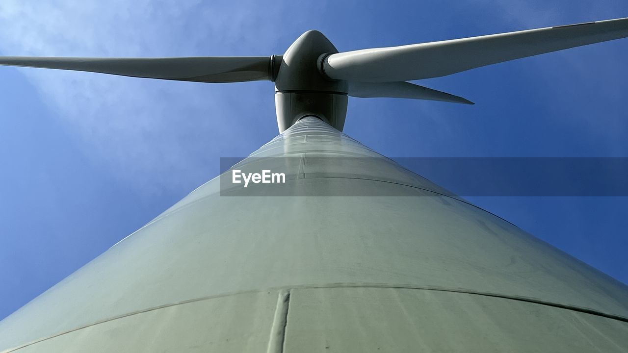 windmill, turbine, sky, power generation, renewable energy, environment, wind turbine, wind power, environmental conservation, alternative energy, blue, nature, wing, wind, no people, architecture, travel, day, outdoors, low angle view, transportation, cloud, technology, air vehicle, airplane, propeller