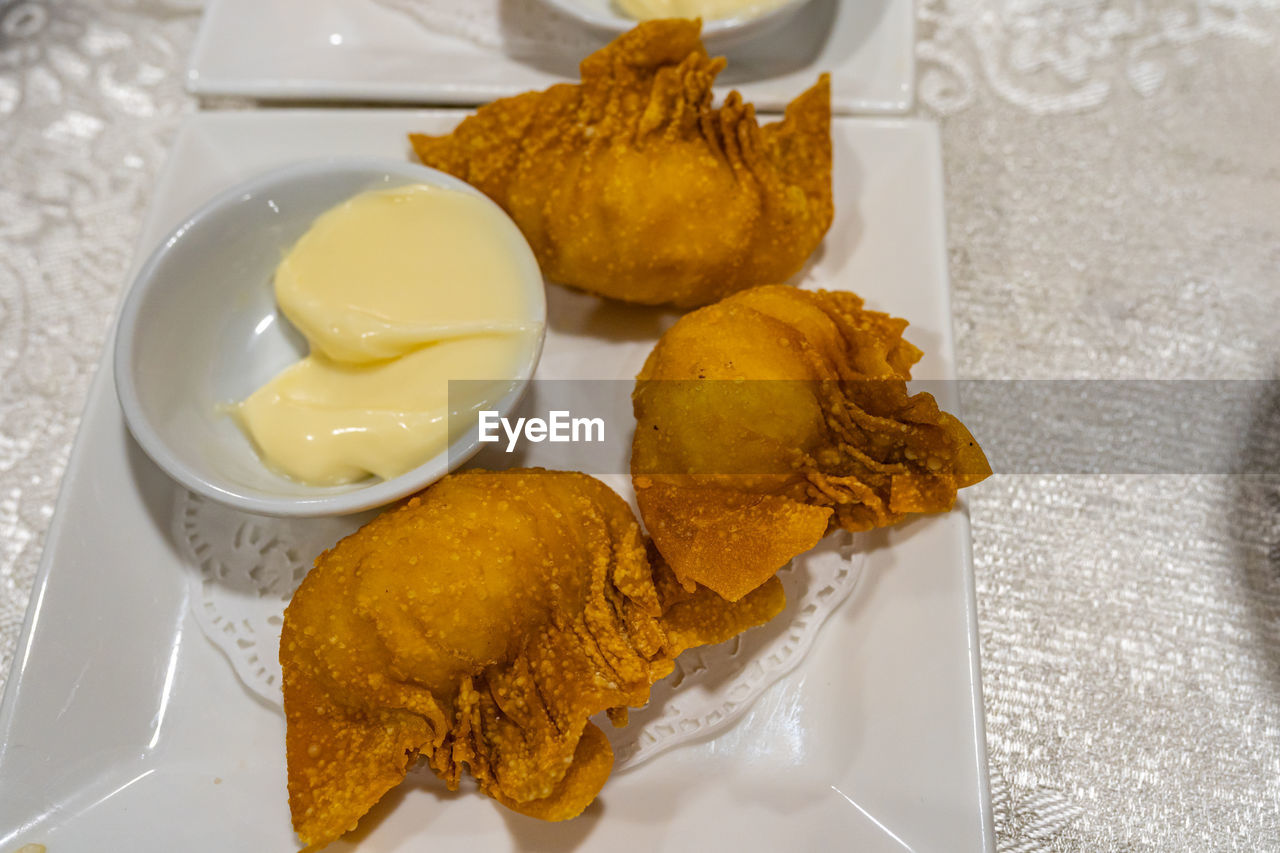 HIGH ANGLE VIEW OF FOOD SERVED ON TABLE