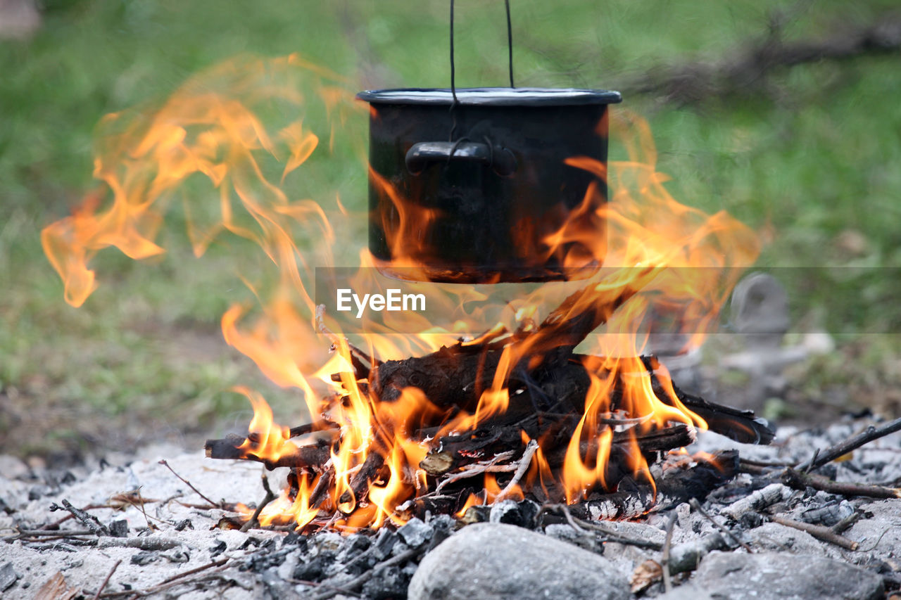 CLOSE-UP OF BONFIRE AT OUTDOORS