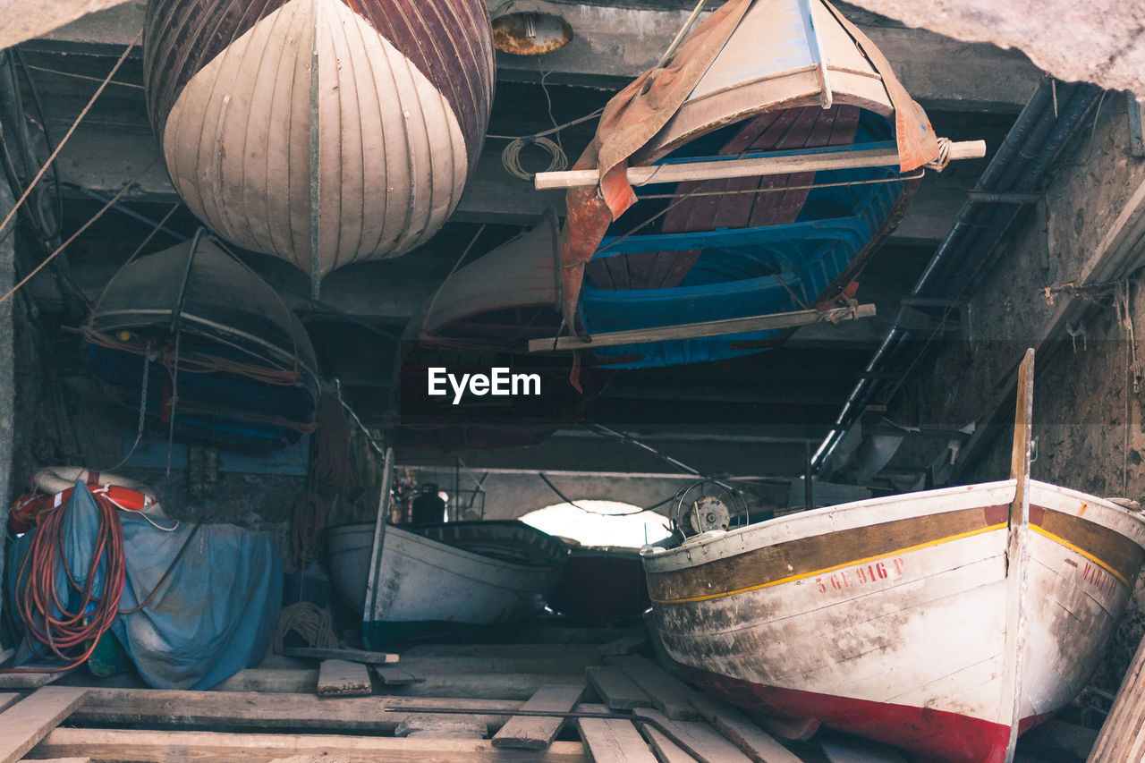 BOATS MOORED IN ROW