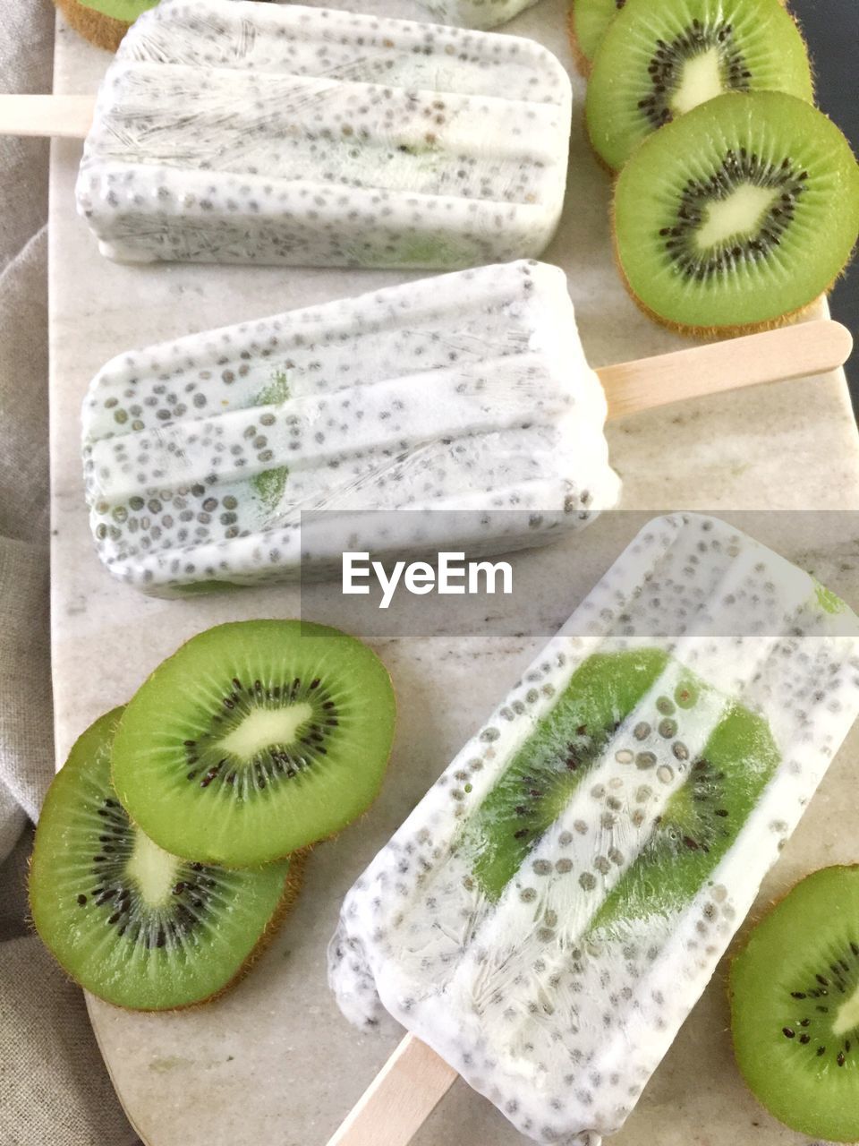 HIGH ANGLE VIEW OF FRUITS IN PLATE ON TABLE