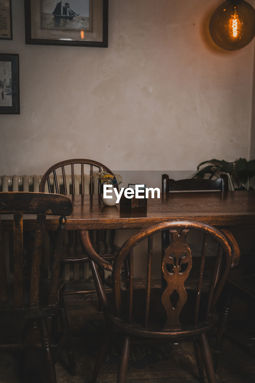 room, seat, indoors, table, chair, no people, dining room, furniture, wood, house, absence, interior design, architecture, home, home interior, wall - building feature, domestic room