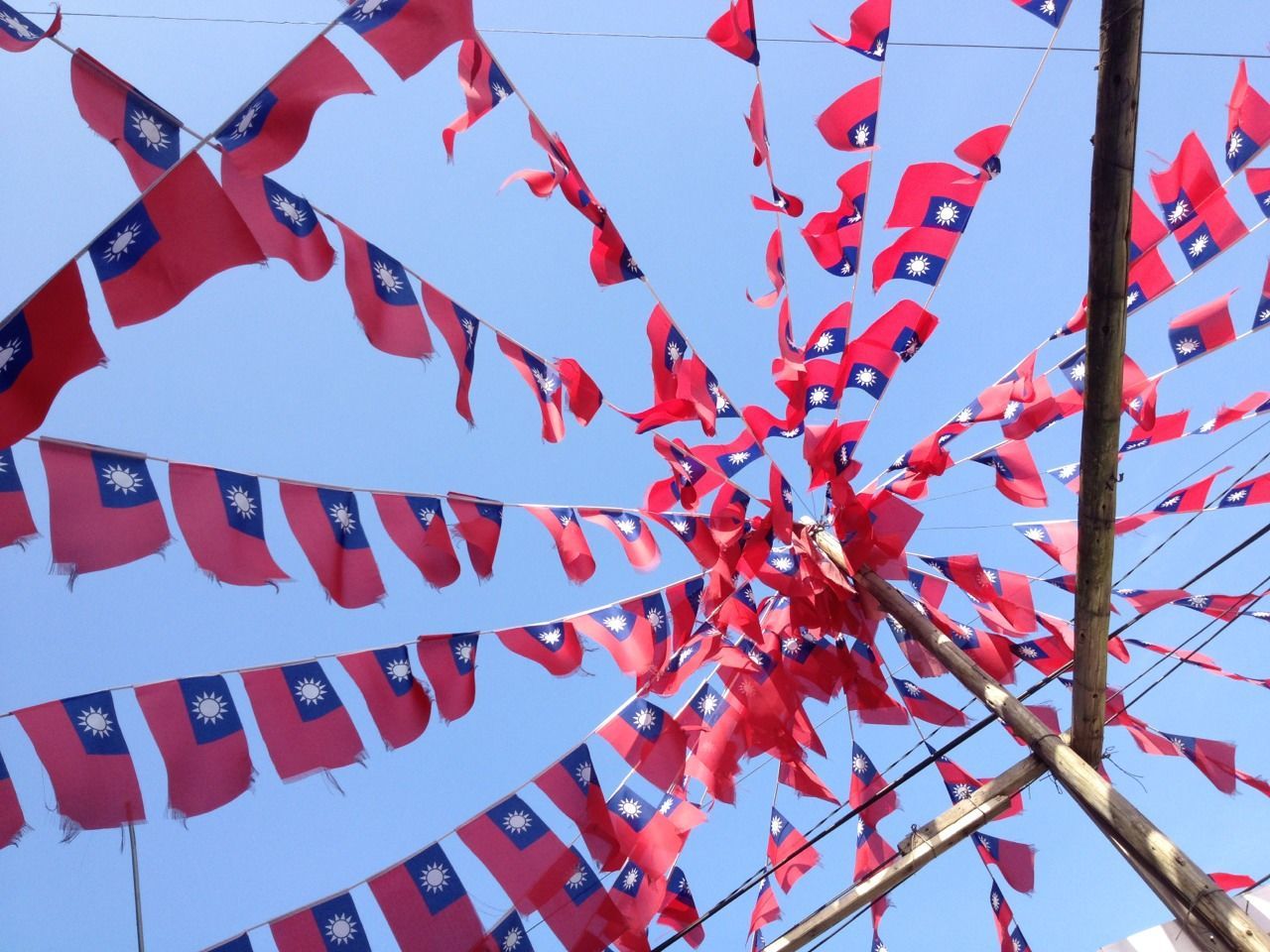 Red and blue bunting against blue sky